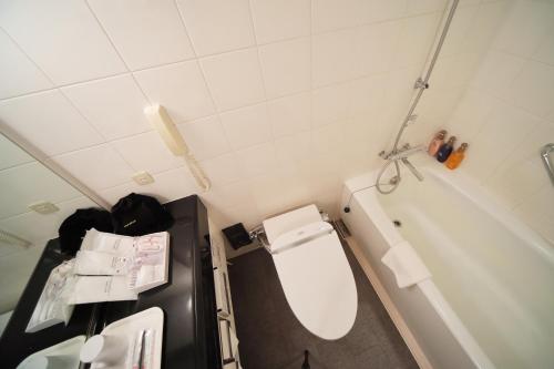 Ένα μπάνιο στο Hotel Sunroute Stellar Ueno