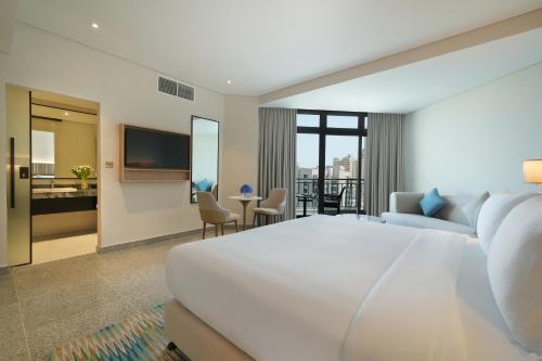 Katil atau katil-katil dalam bilik di Arabian Park Dubai, an Edge by Rotana Hotel