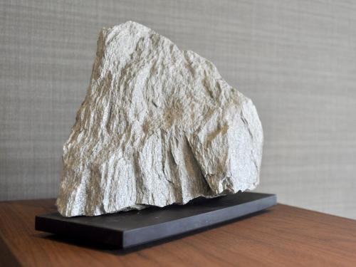 a rock sitting on top of a wooden table at BREATH HOTEL in Fujisawa