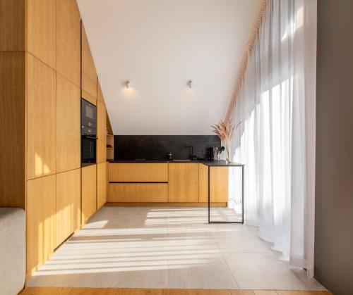 Televisyen dan/atau pusat hiburan di HolidayPlus Multiple Apartments, By Cohost