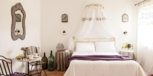Postel nebo postele na pokoji v ubytování Masseria La Chiusa Delle More