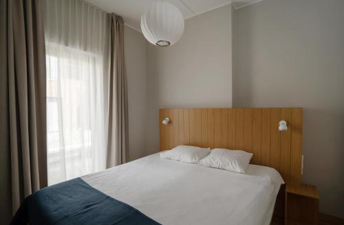 Cama o camas de una habitación en Wasa Resort Hotel, Apartments & SPA