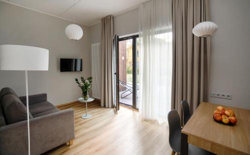 Una televisión o centro de entretenimiento en Wasa Resort Hotel, Apartments & SPA