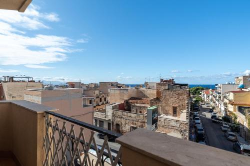 a view of a city from a balcony at Angy Apartment in Terrasini
