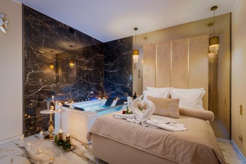 Un ou plusieurs lits dans un hébergement de l'établissement Stacja Galicja Rooms blisko Energylandia