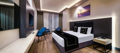 Krevet ili kreveti u jedinici u objektu Hidden Hills Hotel Istanbul Airport