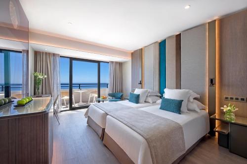 Katil atau katil-katil dalam bilik di Amathus Beach Hotel Limassol