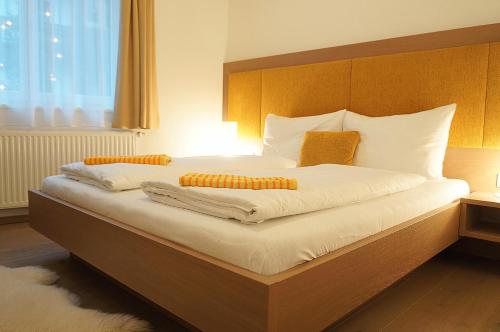 Aparthotel Bergtraumにあるベッド