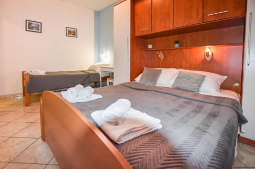 Giường trong phòng chung tại Apartments Ante