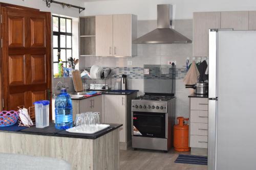 Kuchyň nebo kuchyňský kout v ubytování Cheerful 4-bedroom with pool