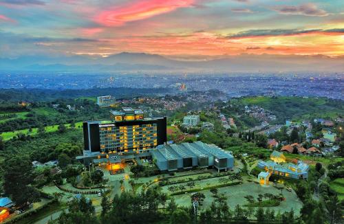 an aerial view of a building in a city at InterContinental Bandung Dago Pakar by IHG in Bandung