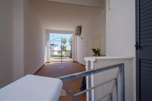 A bed or beds in a room at Appartamento Fico D'india