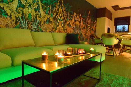 Zona de estar de SuiteDreams-Jungle Suite - Liège