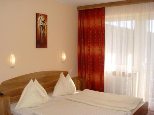 Postel nebo postele na pokoji v ubytování Lachtalhaus