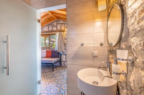 a bathroom with a sink and a mirror at Kaş Joy Glamping in Kas