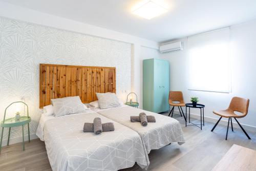 Posteľ alebo postele v izbe v ubytovaní LUMINOSO APARTAMENTO RECIÉN REFORMADO