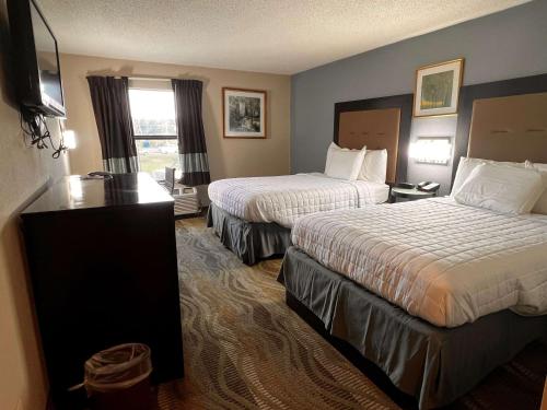 a hotel room with two beds and a window at SureStay Hotel by Best Western Morganton in Morganton