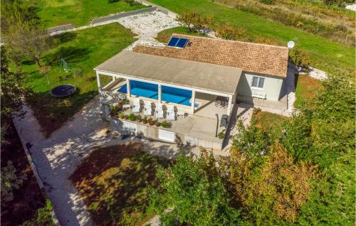 an overhead view of a house with a roof at Lovely Home In Zminj With Kitchen in Žminj