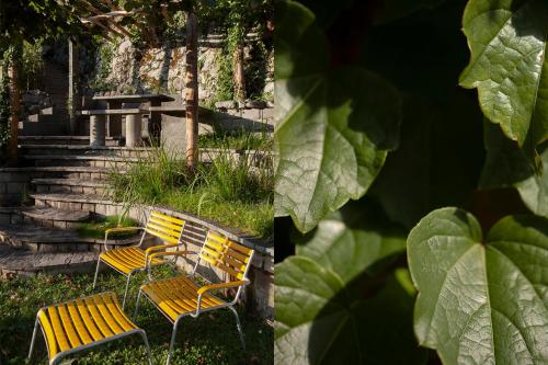two benches sitting next to a set of stairs at Kerenzer15 - The Studio in Mollis