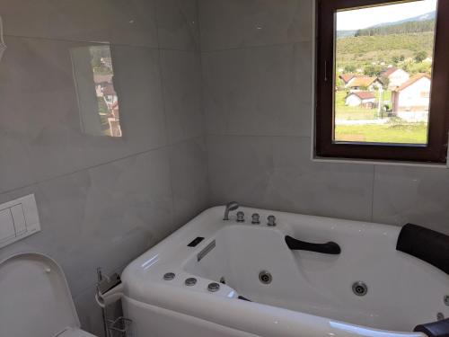 Un baño de Apartments & Restaurant ABAS