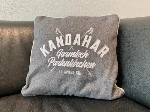 a pillow sitting on the back of a couch at "Mittendrin" in Garmisch in Garmisch-Partenkirchen