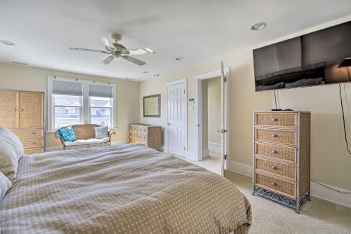 a bedroom with a bed and a flat screen tv at Ventnor City Retreat about 1 Block To Boardwalk! in Ventnor City