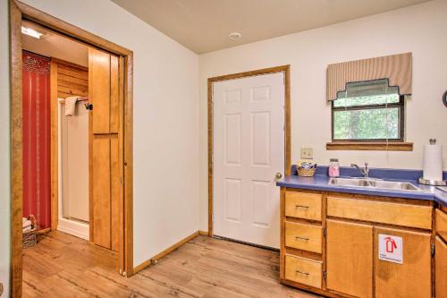 a kitchen with a sink and a counter top at Bright Davis Escape with Screened-In Porch! in Davis