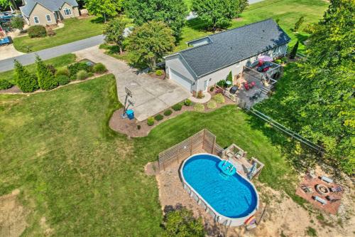 an overhead view of a house with a swimming pool at Peaceful Country Retreat with Easy Highway Access! in Monticello
