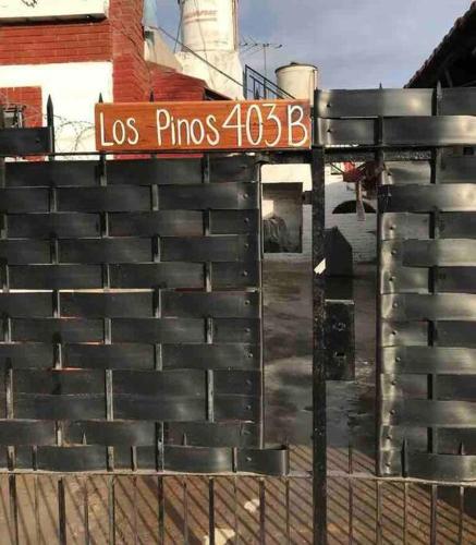 a sign that reads los primos on a building at Studio apartment California 15 minutos de Ezeiza in Monte Grande