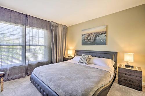 a bedroom with a bed and a large window at Atlantic City Home - Close to Casinos and Beach in Atlantic City