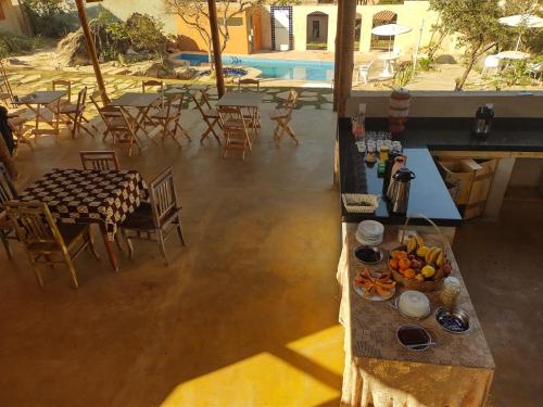 an overhead view of a table and chairs and a pool at Vila Espinhaço in Diamantina