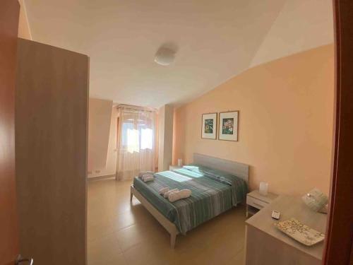 Posteľ alebo postele v izbe v ubytovaní Sunny Home:Palo del Colle