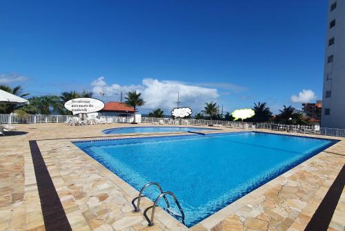 Kolam renang di atau dekat dengan Apto Resort Cambuhy frente Mar Piscina Academia