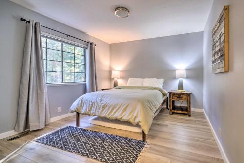 a bedroom with a bed and a window at Modern Tahoe City Home Close to Beaches! in Tahoe City