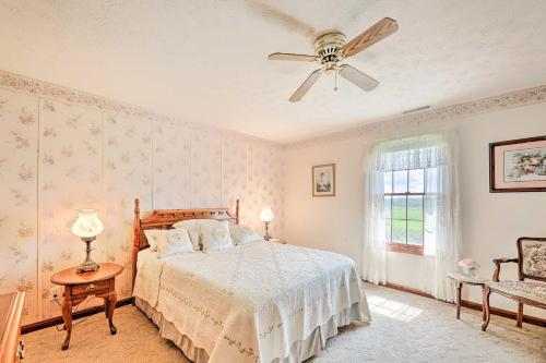 a bedroom with a bed and a ceiling fan at Charming Williamstown Retreat with Private Yard in Williamstown