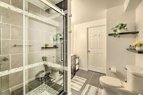 a bathroom with a shower and a toilet at Family-Friendly Brookville Home with Hot Tub! in Brookville