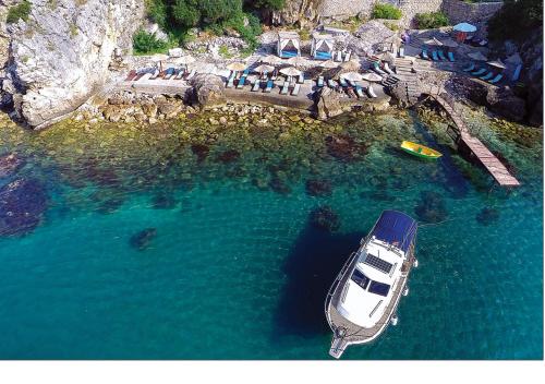an aerial view of a boat in a body of water at Apartments Eneida in Ulcinj