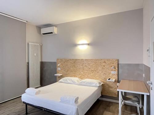 Postel nebo postele na pokoji v ubytování Bergamo Automatic Rooms Self check-in
