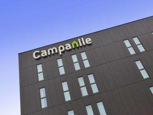 a building with the words campania on it at Campanile Belfort Montbéliard - Gare La Jonxion. in Meroux