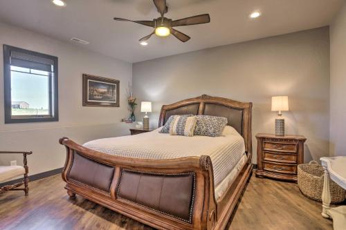 a bedroom with a bed and a ceiling fan at Black Hills Retreat about 3 Mi to ATV Trails! in Piedmont