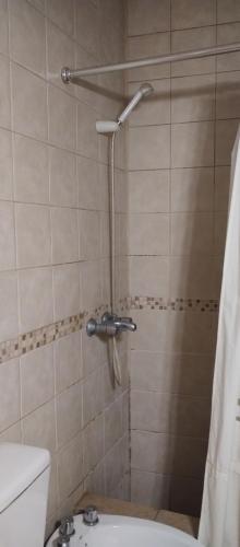 a bathroom with a shower with a toilet and a sink at monoambiente malbec ubicacion privilegiada no mascotas in Mendoza