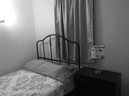 Una cama o camas en una habitación de Casa Del Sol-Unit A
