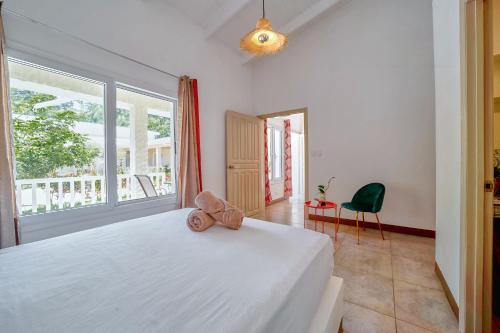 Postel nebo postele na pokoji v ubytování Villa Casa Azul & Arena Blanca Apartamentos