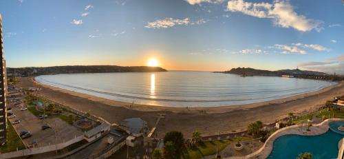 an aerial view of a beach at sunset at Departamento Playa Herradura in Coquimbo