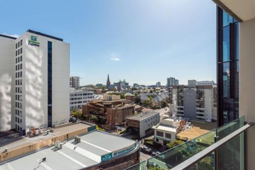 a view of the city from the balcony of a building at Quattro on Astor in Brisbane