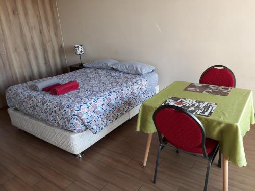 เตียงในห้องที่ Depto. Barcelona Rucakawi 2