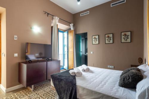 Katil atau katil-katil dalam bilik di Hotel Albaicín