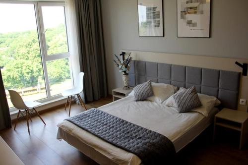 Cama ou camas em um quarto em Warsaw Apartments - Luxury Top-view Aparthotel