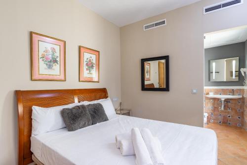 Katil atau katil-katil dalam bilik di Hotel Albaicín