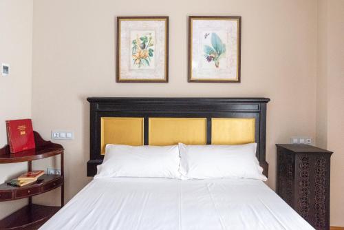 Katil atau katil-katil dalam bilik di Hotel Albaicín